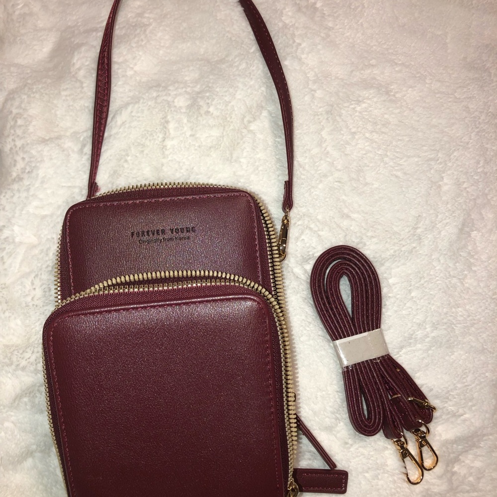 ⭐️ 2 for $25. ‘Forever Young’ phone crossbody bag.